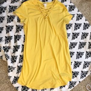 Yellow crisscross v neck shirt